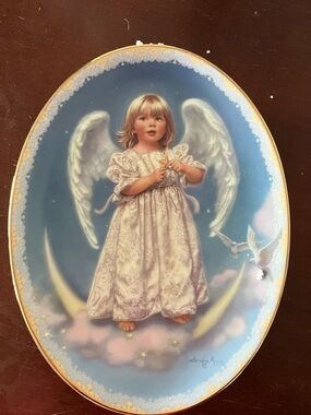Angel Child Oval Wall Plaque in Blue and White by